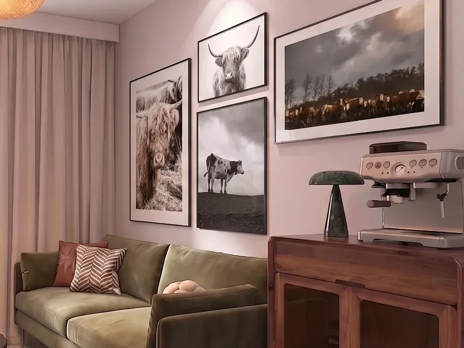 Fragment wizualizacji pomieszczenia socjalnego lecznicy: zielona sofa, grafiki z krowami i ekspres do kawy