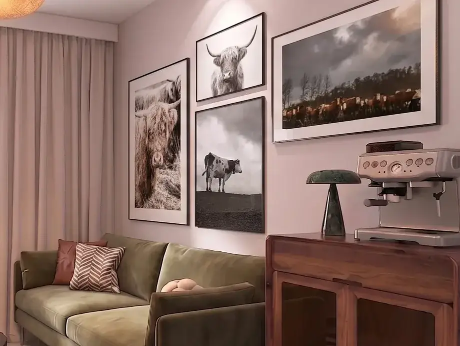 Fragment wizualizacji pomieszczenia socjalnego lecznicy: zielona sofa, grafiki z krowami i ekspres do kawy